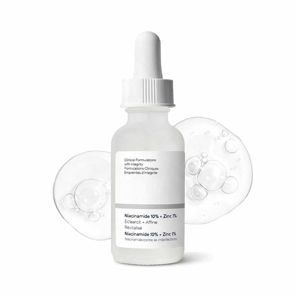 Texture transparente de sérum visage contenant 10 % de niacinamide (vitamine B3) et 1 % de zinc PCA, illustrant une formule purifiante et anti-imperfections